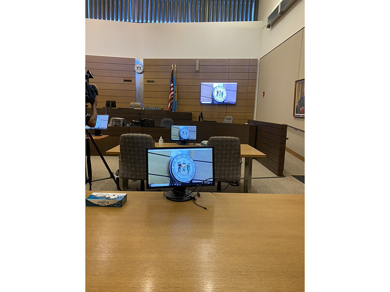 In courtrooms, plastic shields have been placed on the bench, by the judge, and by court clerks and, in some cases, at counsel tables to allow an attorney and his or her client to sit side by sides